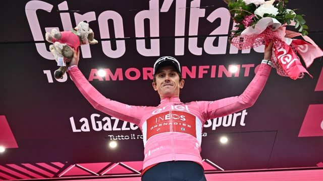 British rider Geraint Thomas of Team Ineos Grenadiers wearing the overall leader's pink jersey celebrates on the podium retaining wearing the overall leader's pink jersey after  the twelveth stage of the 2023 Giro d'Italia cycling race over 179 km from Bra to Rivoli, Italy, 18 May 2023. ANSA/LUCA ZENNARO