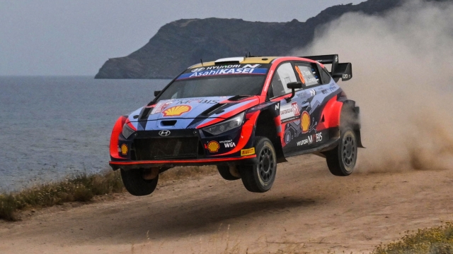 TOPSHOT - Estonian driver Ott Tanak steers his Hyundai assisted by his co-driver Martin Jarveoja, on June 5, 2022 during the SS19 special between Sassari and Argentiera of the Rally of Sardegna, 5th round of the FIA World Rally Championship. (Photo by Andreas SOLARO / AFP)