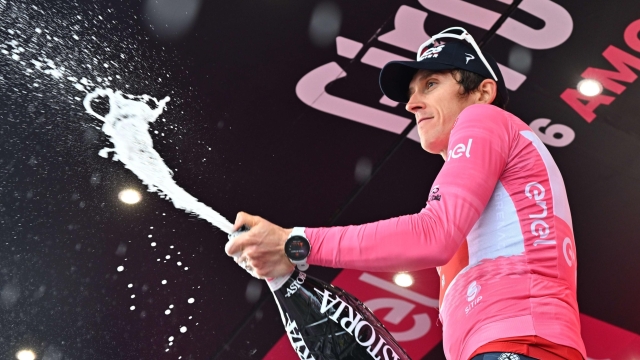 British rider Geraint Thomas of Ineos Grenadiers team wearing the overall leader's pink jersey celebrates on the podium the overall leader's pink jersey after  the nineteenth stage of the 2023 Giro d'Italia cycling race over 183 km from Longarone to Tre Cime di Lavaredo, Italy, 26 May 2023. ANSA/LUCA