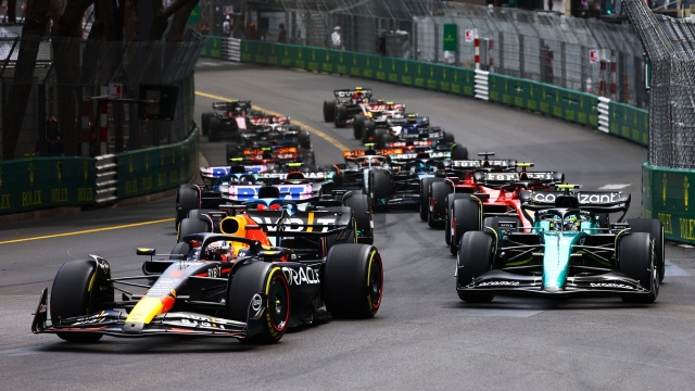 MONTE-CARLO, MONACO - MAY 28: Max Verstappen of the Netherlands driving the (1) Oracle Red Bull Racing RB19 leads Fernando Alonso of Spain driving the (14) Aston Martin AMR23 Mercedes and the rest of the field into turn one at the start during the F1 Grand Prix of Monaco at Circuit de Monaco on May 28, 2023 in Monte-Carlo, Monaco. (Photo by Mark Thompson/Getty Images)
