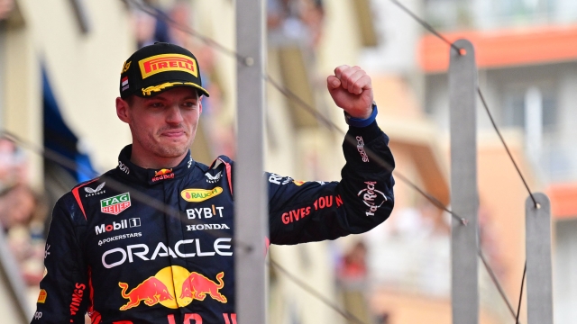 Red Bull Racing's Dutch driver Max Verstappen celebrates on the podium after winning the Formula One Monaco Grand Prix at the Monaco street circuit in Monaco, on May 28, 2023. (Photo by ANDREJ ISAKOVIC / AFP)