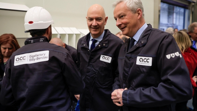 epa10662813 French Finance Minister Bruno Le Maire (R) and French Deputy Minister for Industry Roland Lescure (C) visit the gigafactory of Automotive Cells Company (ACC), a joint venture of Stellantis, TotalEnergies and Mercedes, during its inauguration in Billy-Berclau-Douvrin, northern France, 30 May 2023.  EPA/PASCAL ROSSIGNOL / POOL  MAXPPP OUT
