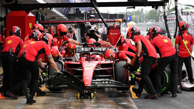 Ferrari's Monegasque driver Charles Leclerc changes tyres during the third free practice session of the Spanish Formula One Grand Prix at the Circuit de Catalunya on June 3, 2023 in Montmelo, on the outskirts of Barcelona. (Photo by JAVIER SORIANO / AFP)