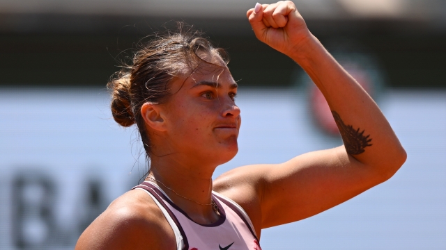 PARIS, FRANCE - JUNE 06: Aryna Sabalenka celebrates a point against Elina Svitolina of Ukraine during the Women's Singles Quarter Final match on Day Ten of the 2023 French Open at Roland Garros on June 06, 2023 in Paris, France. (Photo by Clive Mason/Getty Images)
