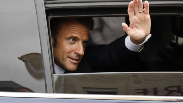 French President Emmanuel Macron waves after his visit of the Arromanches D-Day museum as part of the 79th anniversary of the World War II "D-Day" Normandy landings, in Arromanches, Normandy, Tuesday, June 6, 2023. Dozens of World War II veterans have traveled to Normandy to mark the 79th anniversary of D-Day, the decisive but deadly assault that led to the liberation of France and Western Europe from Nazi control. ( Ludovic Marin, Pool via AP)