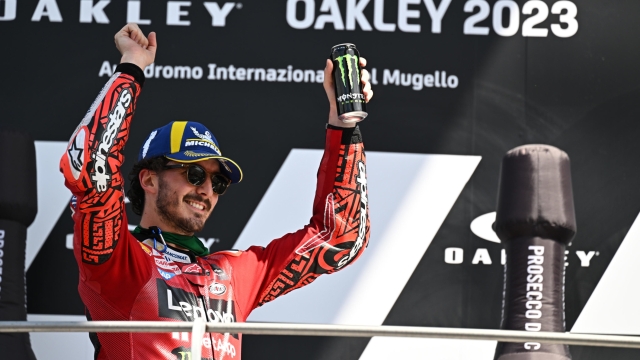 Italian rider Francesco Bagnaia of Ducati Lenovo Team celebrates after winning the MotoGP race of the Motorcycling Grand Prix of Italy at the Mugello circuit in Scarperia, central Italy, 11 June 2023. ANSA/CLAUDIO GIOVANNINI