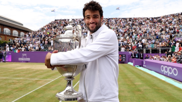 LONDON, ENGLAND - JUNE 19: Matteo Berrettini of Italy celebrates with the trophy after winning against Filip Krajinovic of Serbia during the Men's Singles Final match on day seven of the cinch Championships at The Queen's Club on June 19, 2022 in London, England. (Photo by Clive Brunskill/Getty Images) *** BESTPIX ***