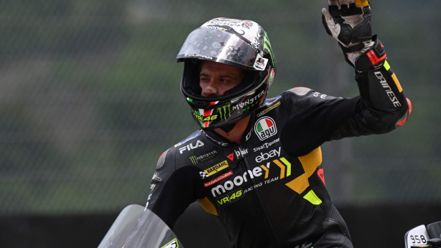 Ducati Italian rider Marco Bezzecchi reacts after the qualifying rounds ahead of the Italian MotoGP race at Mugello Circuit in Mugello, on June 10, 2023. (Photo by Filippo MONTEFORTE / AFP)