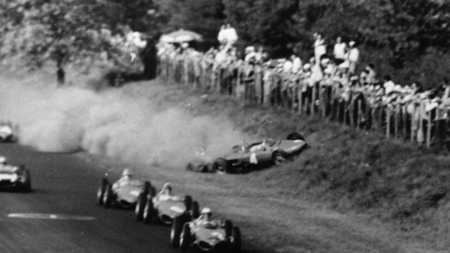 10th September 1961:  The Ferrari of Wolfgang von Trips is about to crash into the crowd during the disaster at Monza. The car in the lead is No2  driven by Phil Hill who went on to win the race.  (Photo by Keystone/Getty Images)