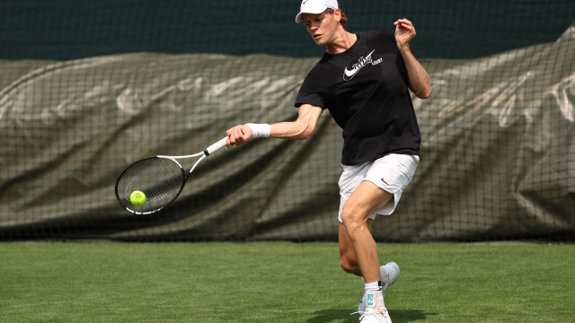 LONDON, ENGLAND - JUNE 29: Jannik Sinner of Italy plays a forehand during a practice session ahead of The Championships - Wimbledon 2023 at All England Lawn Tennis and Croquet Club on June 29, 2023 in London, England. (Photo by Clive Brunskill/Getty Images)