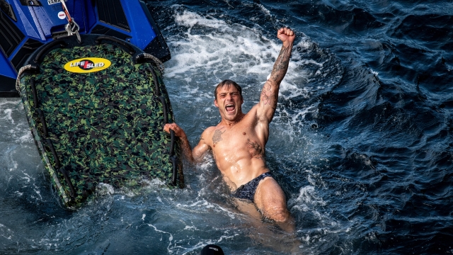 Alessandro De Rose of Italy reacts after diving from the 27.5 metre platform during the final competition day of the fourth stop of the Red Bull Cliff Diving World Series at Downpatrick Head, Ireland on September 12, 2021. // Dean Treml / Red Bull Content Pool // SI202109120492 // Usage for editorial use only //