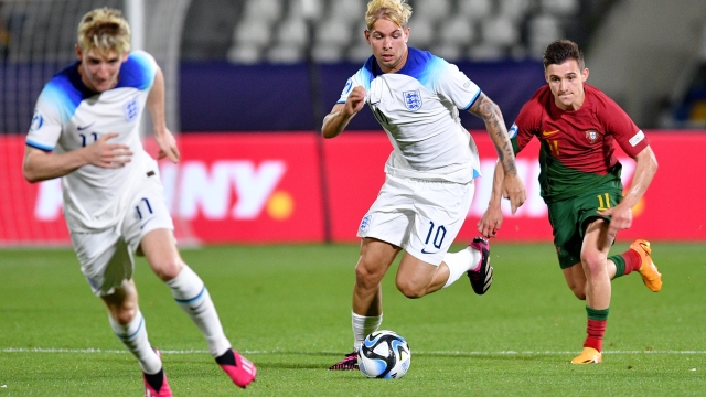 KUTAISI, GEORGIA - JULY 02: Emile Smith Rowe of England runs with the ball whilst under pressure from Francisco Conceicao of Portugal during the UEFA Under-21 Euro 2023 Quarter Final match between England and Portugal at Shengelia Arena on July 02, 2023 in Kutaisi, Georgia. (Photo by Levan Verdzeuli/Getty Images)