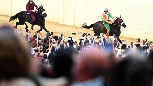 Jockey Giovanni Atzeni, called Tittia, on horse Violenta Da Codia, wins the historical Italian horse race Palio di Siena, in Siena, Italy, 02 July 2023.  ANSA/CLAUDIO GIOVANNINI
