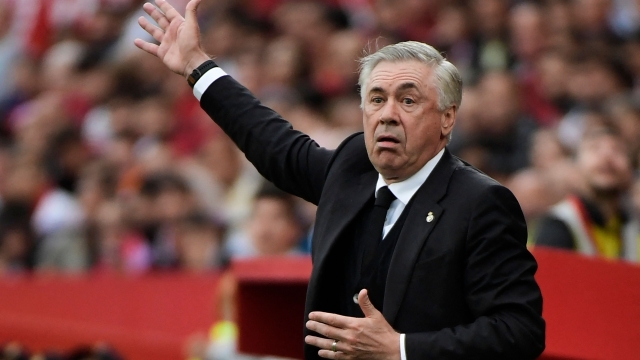 Real Madrid's Italian coach Carlo Ancelotti gestures on the sidelines during the Spanish league football match between Sevilla FC and Real Madrid CF at the Ramon Sanchez Pizjuan stadium in Seville on May 27, 2023. (Photo by CRISTINA QUICLER / AFP)