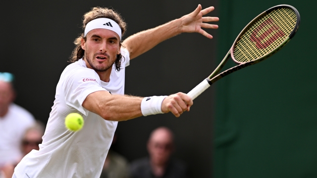 LONDON, ENGLAND - JULY 08: Stefanos Tsitsipas of Greece plays a backhand against Laslo Djere of Serbia in the Men's Singles third round match during day six of The Championships Wimbledon 2023 at All England Lawn Tennis and Croquet Club on July 08, 2023 in London, England. (Photo by Mike Hewitt/Getty Images)