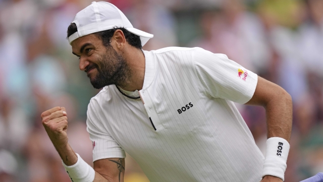 Italy's Matteo Berrettini reacts as he plays Spain's Carlos Alcaraz in a men's singles match on day eight of the Wimbledon tennis championships in London, Monday, July 10, 2023. (AP Photo/Alberto Pezzali)