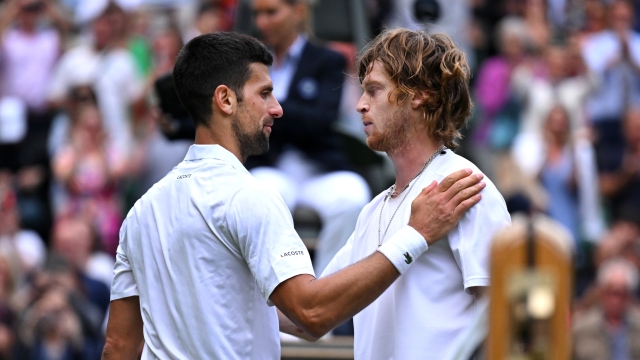 LONDON, ENGLAND - JULY 11: Novak Djokovic of Serbia acknowledges Andrey Rublev following the Men's Singles Quarter Final match during day nine of The Championships Wimbledon 2023 at All England Lawn Tennis and Croquet Club on July 11, 2023 in London, England. (Photo by Shaun Botterill/Getty Images)