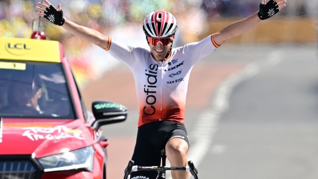 Cofidis' Spanish rider Ion Izaguirre Insausti cycles to the finish line to win the 12th stage of the 110th edition of the Tour de France cycling race, 169 km between Roanne and Belleville-en-Beaujolais, in central-eastern France, on July 13, 2023. (Photo by Marco BERTORELLO / AFP)