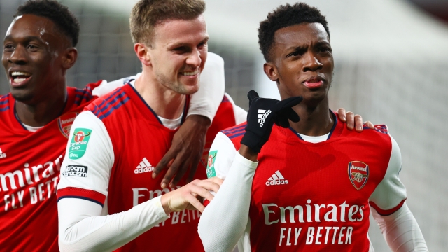 LONDON, ENGLAND - DECEMBER 21: Eddie Nketiah of Arsenal (R) celebrates with teammates Rob Holding and Folarin Balogun of Arsenal after scoring their team's first goal during the Carabao Cup Quarter Final match between Arsenal and Sunderland at Emirates Stadium on December 21, 2021 in London, England. (Photo by Julian Finney/Getty Images)