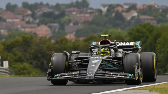 British Formula One driver Lewis Hamilton of Mercedes-AMG Petronas steers his car during the first practice session ahead of Sunday's Formula One Hungarian Grand Prix auto race, at the Hungaroring racetrack in Mogyorod, near Budapest, Hungary, Friday, July 21, 2023. (AP Photo/Denes Erdos)