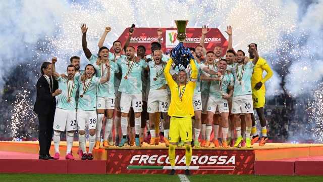 ROME, ITALY - MAY 24:  Samir Handanovic of FC Internazionale rises up the trophy with his team-mates at the end of the Coppa Italia final match between ACF Fiorentina and FC Internazionale at Stadio Olimpico on May 24, 2023 in Rome, Italy. (Photo by Mattia Ozbot - Inter/Inter via Getty Images)