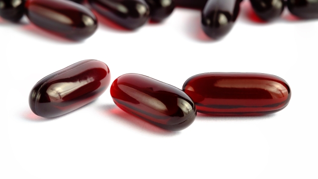 Krill oil omega 3 capsules that made from a species of Antarctic krill, Euphausia superba over isolated white background