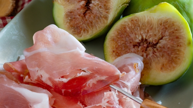 plate of figs and raw ham, a typical Italian mediterranean appetizer