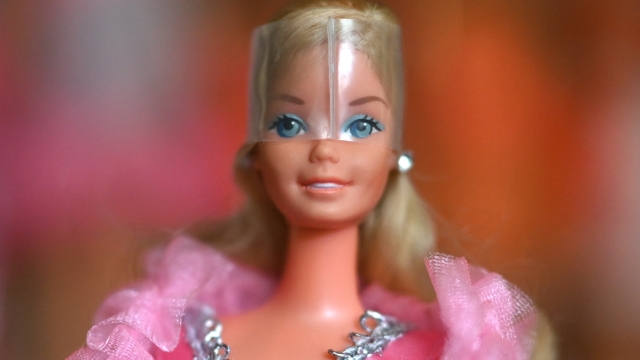 A photo shows the first Barbie doll with pink colours at the "Barbie clinic" of collector Bettina Dorfmann in Duesseldorf, western Germany on July 25, 2023. With her collection of 18,000 Barbies, German Bettina Dorfmann was already in the Guinness Book of Records since 2017. But the release of the "Barbie" movie last week has given new impetus to her collection dolls, which she exhibits in museums. (Photo by Ina FASSBENDER / AFP)