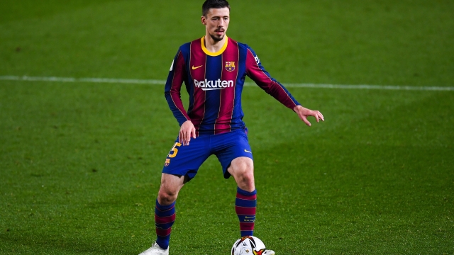 BARCELONA, SPAIN - MARCH 03: Clement Lenglet of FC Barcelona runs with the ball during the Copa del Rey Semi Final Second Leg match between FC Barcelona and Sevilla at Camp Nou on March 03, 2021 in Barcelona, Spain. Sporting stadiums around Spain remain under strict restrictions due to the Coronavirus Pandemic as Government social distancing laws prohibit fans inside venues resulting in games being played behind closed doors. (Photo by David Ramos/Getty Images)