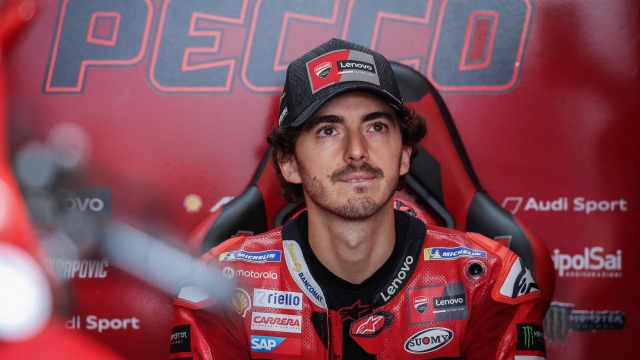 (FILES) Ducati Lenovo Team's Italian rider Francesco Bagnaia sits in his box during the first free practice session for the MotoGP German motorcycle Grand Prix at the Sachsenring racing circuit in Hohenstein-Ensisternal near Chemnitz, eastern Germany, on June 16, 2023. After his victory in the Netherlands at the end of June, reigning MotoGP World Champion Francesco Bagnaia will have the opportunity to extend his lead at the top of the championship at the British Grand Prix at Silverstone on the weekend of August 4, 2023. (Photo by Ronny Hartmann / AFP)