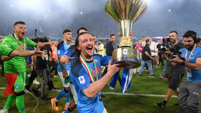 NAPLES, ITALY - JUNE 04: Mario Rui of SSC Napoli celebrates with the Serie A trophy following  the Serie A match between SSC Napoli and UC Sampdoria at Stadio Diego Armando Maradona on June 04, 2023 in Naples, Italy. (Photo by Francesco Pecoraro/Getty Images)