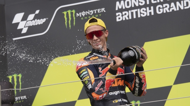 NORTHAMPTON, ENGLAND - AUGUST 06: Pedro Acosta of Spain and Red Bull KTM Ajo celebrates the third place on the podium during the Moto2 race during the MotoGP of Great Britain - Race at Silverstone Circuit on August 06, 2023 in Northampton, England. (Photo by Mirco Lazzari gp/Getty Images)