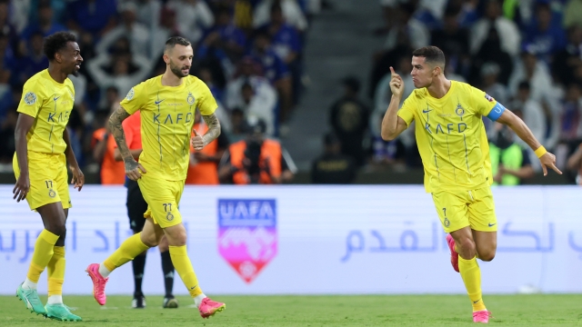 RIYADH, SAUDI ARABIA - AUGUST 12: Cristiano Ronaldo of Al Nassr celebrates after scoring the team's first goal during the Arab Club Champions Cup Final between Al Hilal and Al Nassr at King Fahd International Stadium on August 12, 2023 in Riyadh, Saudi Arabia. (Photo by Yasser Bakhsh/Getty Images)