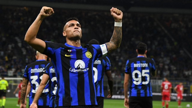 Inter Milan's Argentine forward #10 Lautaro Martinez celebrates after scoring during the Italian Serie A football match Inter Milan vs Monza at the San Siro stadium in Milan, on August 19, 2023. (Photo by Isabella BONOTTO / AFP)