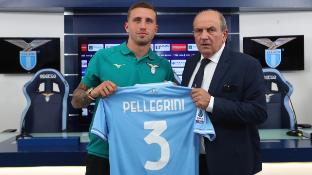 ROME, ITALY - AUGUST 25: SS Lazio New Signing Luca Pellegrini and Sport Director Angelo Fabiani pose with SS Lazio jersey before the press conference at Formello sport centre on August 25, 2023 in Rome, Italy. (Photo by Paolo Bruno/Getty Images)