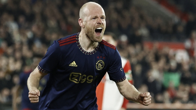 Ajax's Dutch midfelder Davy Klaassen celebrates his team's second goal during the Dutch Cup semi-final football match between Feyenoord and Ajax at Feyenoord Stadion de Kuip in Rotterdam on April 5, 2023. - In the 63rd minute, the semi-final was interrupted for almost half an hour by referee Allard Lindhout when a lighter thrown from the stands hit Ajax player Davy Klaassen in the head, causing him to bleed. (Photo by MAURICE VAN STEEN / ANP / AFP) / Netherlands OUT