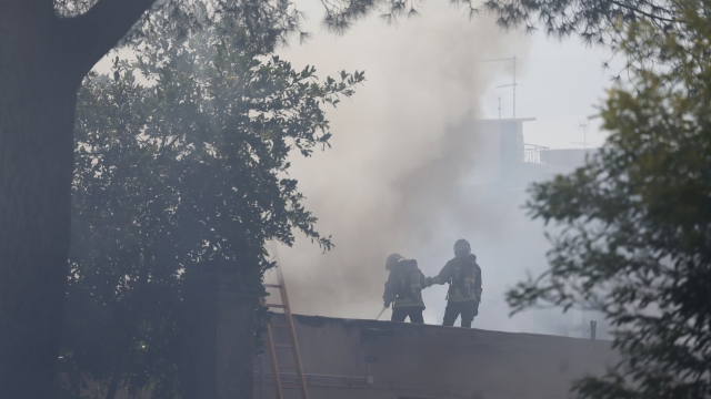 Foto Cecilia Fabiano /LaPresse   02? 9? 2023?Roma ? Italia ? Incendio di una palestra tra i palazzi del Trullo ? Nella Foto : l?incendio in via monte delle capre  September 02, 2023 ?Rome Italy ? News ?Murder in the Collatina area, two people bring a man wounded by gunshots in a shopping cart to a police patrol, shortly after the man dies? Fire in a popular neighborhood in the Photo  : firemen at work