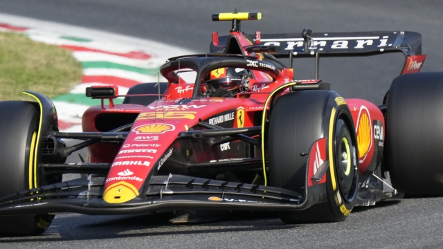 Ferrari driver Carlos Sainz of Spain steers his car during the qualifying session ahead of Sunday's Formula One Italian Grand Prix auto race, at the Monza racetrack, in Monza, Italy, Saturday, Sept. 2, 2023. (AP Photo/Luca Bruno)