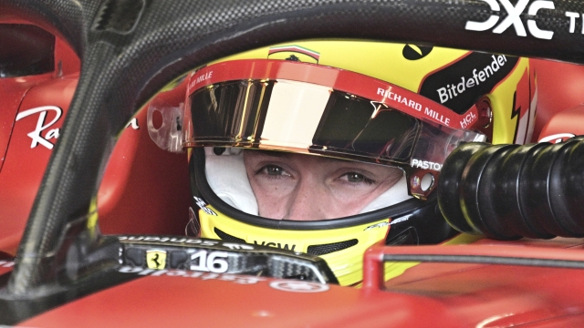 Ferrari driver Charles Leclerc of Monaco sits in his car his car during the qualifying session ahead of Sunday's Formula One Italian Grand Prix auto race, at the Monza racetrack, in Monza, Italy, Saturday, Sept. 2, 2023. (Christian Bruna/Pool via AP)