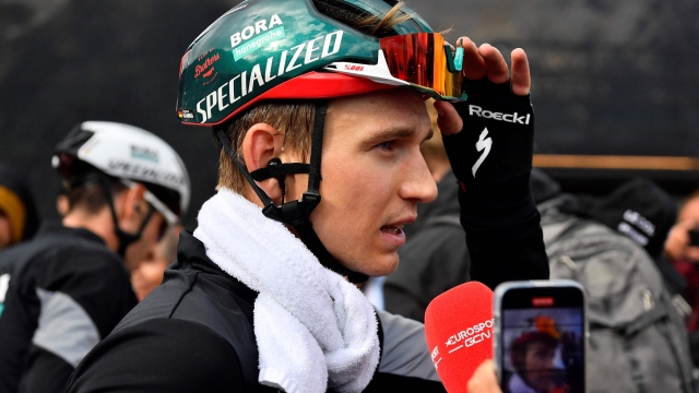 Team Bora's German rider Lennard Kamna talks to media after the third stage of the 2023 La Vuelta cycling tour of Spain, a 158,5 km race from Suria to Arinsal, in Andorra, on August 28, 2023. (Photo by Pau BARRENA / AFP)