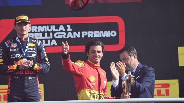 Third placed Spanish driver Carlos Sainz of Scuderia Ferrari celebrates on the podiunof the Italian Formula One Grand Prix at the Autodromo Nazionale in Monza, Italy, 3 september 2023. ANSA/DANIEL DAL ZENNARO