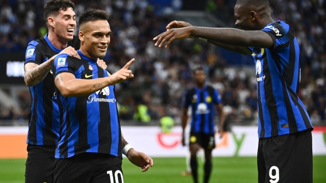 Inter Milan's Argentine forward #10 Lautaro Martinez (2nd L) celebrates with Inter Milan's French forward #09 Marcus Thuram after scoring his team's second goal during the Italian Serie A football match between Inter Milan and Fiorentina at San Siro stadium in Milan on September 3, 2023. (Photo by Isabella BONOTTO / AFP)