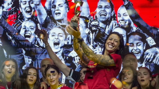 FILE - Spain's Jennifer Hermoso holds the trophy as they celebrate their Women's World Cup victory on stage in Madrid, Spain, Monday, Aug. 21, 2023. Spanish state prosecutors say soccer player Jenni Hermoso has accused Luis Rubiales of sexual assault for kissing her on the lips without her consent after the Women's World Cup final. (AP Photo/Manu Fernandez, File)