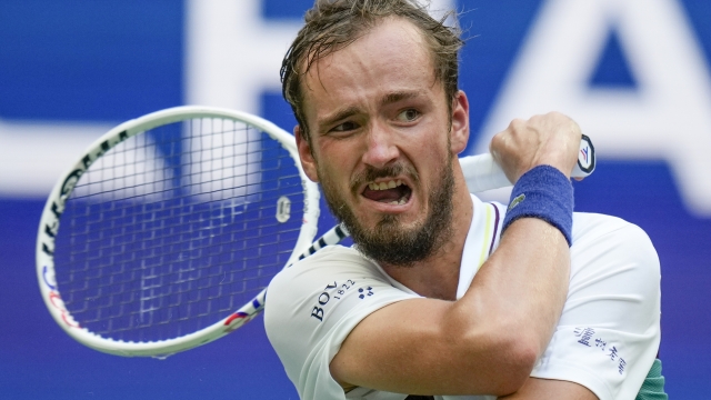 Daniil Medvedev, of Russia, returns a shot to Andrey Rublev, of Russia, during the quarterfinals of the U.S. Open tennis championships, Wednesday, Sept. 6, 2023, in New York. (AP Photo/Seth Wenig)