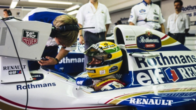 IMOLA, ITALY - MAY 01: Ayrton Senna, Williams FW16 Renault, watches a timing monitor in the garage with David Brown during the San Marino GP at Imola on May 01, 1994 in Imola, Italy. (Photo by Rainer Schlegelmilch)