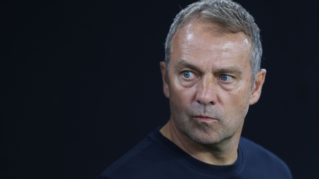 Germany's coach Hans-Dieter Flick follows the action from the sidelines during the friendly football match between Germany and Japan at the Volkswagen Arena in Wolfsburg, central Germany, on September 9, 2023. (Photo by Ronny HARTMANN / AFP)