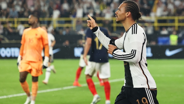 DORTMUND, GERMANY - SEPTEMBER 12: Leroy Sane of Germany celebrates after scoring the team's second goal during the International Friendly match between Germany and France at Signal Iduna Park on September 12, 2023 in Dortmund, Germany. (Photo by Christof Koepsel/Getty Images)