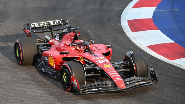 Ferrari's Monegasque driver Charles Leclerc drives during the first practice session of the Singapore Formula One Grand Prix night race at the Marina Bay Street Circuit in Singapore on September 15, 2023. (Photo by ROSLAN RAHMAN / AFP)