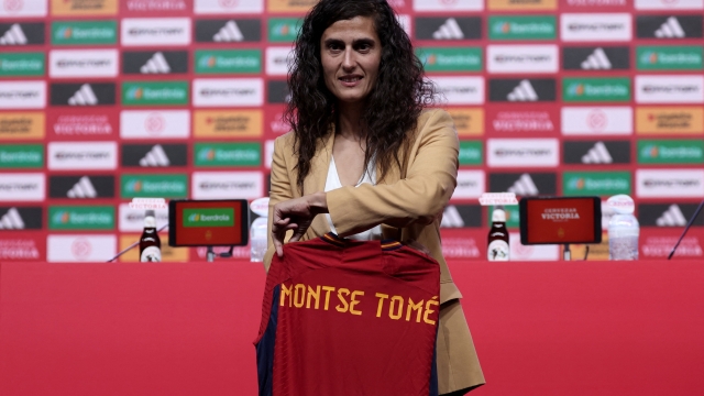 New coach of Spain's female football team Montse Tome poses with a jersey following a press conference at the Ciudad del Futbol training facilities in Las Rozas de Madrid on September 18, 2023, ahead of the UEFA Nations League football matches against Sweden and Switzerland. Spain won the Women's World Cup in August but the four weeks since have been filled with controversy and turmoil after former president Luis Rubiales forcibly kissed midfielder Jenni Hermoso. (Photo by Thomas COEX / AFP)