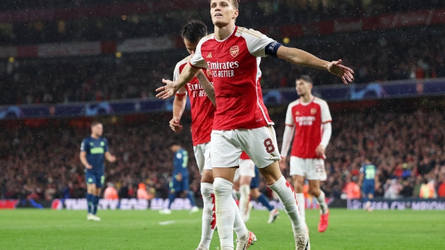 LONDON, ENGLAND - SEPTEMBER 20: Martin Oedegaard of Arsenal celebrates after scoring the team's fourth goal during the UEFA Champions League match between Arsenal FC and PSV Eindhoven at Emirates Stadium on September 20, 2023 in London, England. (Photo by Julian Finney/Getty Images)